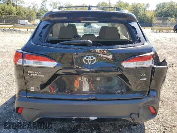 ✅ 2022 Toyota Corolla Cross LE • VIN: 7MUCAABG6NV011556 • Lot: 86860385. Listed on Copart with 76,445 mi. Free auction sales archive from the USA and detailed vehicle history report at DreamBid. Image 6.