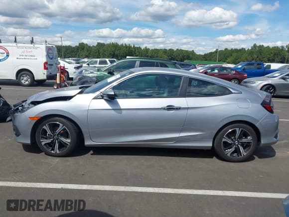 ✅ 2017 Honda Civic Touring • VIN: 2HGFC3B90HH358545 • Lot: 43118739. Listed on IAAI with 35,930 mi. Free auction sales archive from the USA and detailed vehicle history report at DreamBid. Image 14.