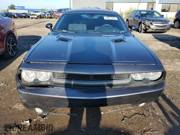 2014 Dodge Challenger SXT z VIN 2C3CDYAG7EH244876, wystawiony jako Copart lot #68067264 z przebiegiem 130 669 mil mil oraz Czysty tytuł • Clean title. Historia ofert i sprzedaży dostępna na DreamBid. Obrazek 5.