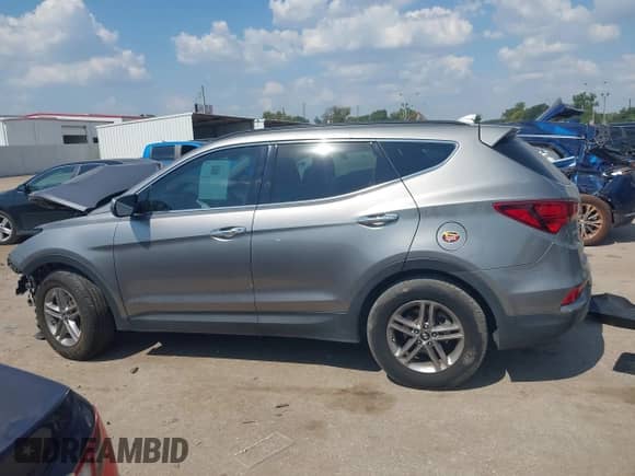 2018 Hyundai Santa Fe 2.4L z VIN 5NMZUDLB1JH065408, wystawiony jako IAAI lot #43342396 z przebiegiem 113 154 mil mil oraz . Historia ofert i sprzedaży dostępna na DreamBid. Obrazek 14.