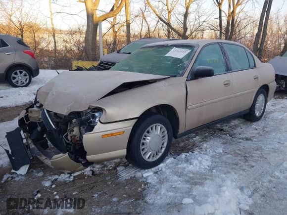 2003 Chevrolet Malibu z VIN 1G1ND52J03M665399, wystawiony jako IAAI lot #41363185 z przebiegiem 88 217 mil mil oraz . Historia ofert i sprzedaży dostępna na DreamBid. Obrazek 2.