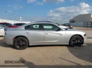 ✅ 2023 Dodge Charger SXT • VIN: 2C3CDXJG8PH567136 • Lot: 43770123. Listed on IAAI with 46,127 mi. Free auction sales archive from the USA and detailed vehicle history report at DreamBid. Image 12.