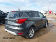 ✅ 2019 Ford Escape SE • VIN: 1FMCU0GD5KUB57055 • Lot: 43302551. Listed on IAAI with 52,970 mi. Free auction sales archive from the USA and detailed vehicle history report at DreamBid. Image 4.