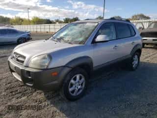 2005 Hyundai Tucson GLS z VIN KM8JN72D65U110562, wystawiony jako Copart lot #81992635 z przebiegiem 94 322 mil mil oraz Szkoda całkowita • Salvage title. Historia ofert i sprzedaży dostępna na DreamBid. Obrazek 1.