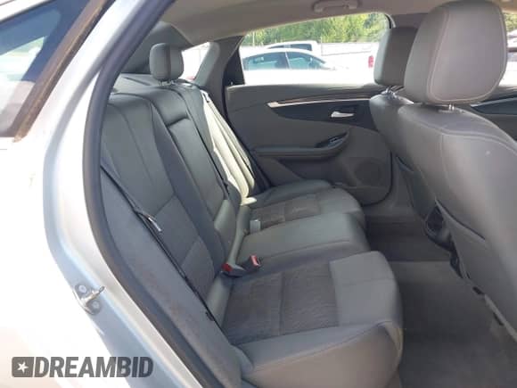 2018 Chevrolet Impala LT z VIN 2G1105S3XJ9170262, wystawiony jako IAAI lot #42963598 z przebiegiem 163 813 mil mil oraz . Historia ofert i sprzedaży dostępna na DreamBid. Obrazek 8.