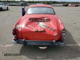 ✅ 1970 Volkswagen Karmann Ghia • VIN: 1402102095 • Lot: 50589955. Wystawiony na Copart z przebiegiem 76 796 mil. Bezpłatny archiwum sprzedaży aukcyjnych z USA i szczegółowy raport historii pojazdu na DreamBid. Zdjęcie 6.