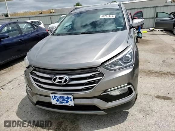 2017 Hyundai Santa Fe 2.0T z VIN 5XYZUDLA9HG437458, wystawiony jako Copart lot #57751415 z przebiegiem 117 469 mil mil oraz Szkoda całkowita • Salvage title. Historia ofert i sprzedaży dostępna na DreamBid. Obrazek 14.