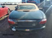 ✅ 2001 Jaguar XK • VIN: SAJDA42C11NA16486 • Lot: 75705144. Listed on Copart with Not provided. Free auction sales archive from the USA and detailed vehicle history report at DreamBid. Image 6.