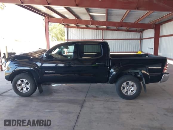 ✅ 2013 Toyota Tacoma PreRunner • VIN: 3TMJU4GN0DM145723 • Lot: 42785140. Listed on IAAI with 217,595 mi. Free auction sales archive from the USA and detailed vehicle history report at DreamBid. Image 14.