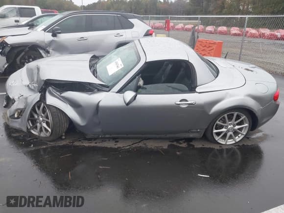 ✅ 2012 Mazda MX-5 Miata Grand Touring • VIN: JM1NC2PF2C0222885 • Lot: 43547461. Listed on IAAI with 82,803 mi. Free auction sales archive from the USA and detailed vehicle history report at DreamBid. Image 14.