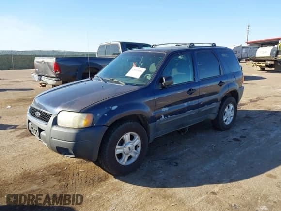 ✅ 2003 Ford Escape XLT Popular 2 • VIN: 1FMYU93193KC87505 • Lot: 43532686. Listed on IAAI with 138,748 mi. Free auction sales archive from the USA and detailed vehicle history report at DreamBid. Image 17.