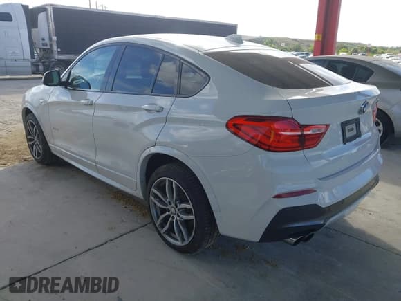 ✅ 2016 BMW X4 xDrive28i • VIN: 5UXXW3C58G0R18691 • Lot: 43922366. Listed on IAAI with 102,409 mi. Free auction sales archive from the USA and detailed vehicle history report at DreamBid. Image 3.