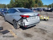 ✅ 2021 Nissan Versa SV • VIN: 3N1CN8EVXML826061 • Lot: 43499323. Listed on IAAI with 100,000 mi. Free auction sales archive from the USA and detailed vehicle history report at DreamBid. Image 3.