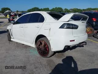 ✅ 2013 Mitsubishi Lancer Evolution MR • VIN: JA32W5FV0DU005865 • Lot: 43562680. Wystawiony na IAAI z przebiegiem 73 420 mil. Bezpłatny archiwum sprzedaży aukcyjnych z USA i szczegółowy raport historii pojazdu na DreamBid. Zdjęcie 3.