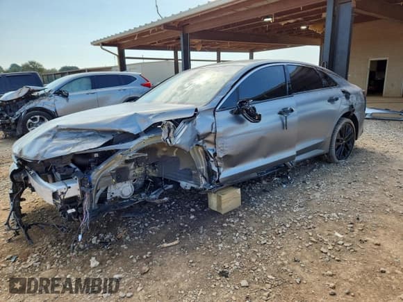 ✅ 2025 Kia K5 GT • VIN: KNAG44J82S5348853 • Лот: 80570515. Опубликован ранее на Copart с пробегом 13 007 миль. Бесплатный доступ к архиву аукционных продаж из США и подробный отчёт об истории автомобиля на DreamBid. Изображение 1.