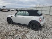 ✅ 2014 MINI Convertible • VIN: WMWZN3C55ET861050 • Lot: 91887315. Listed on Copart with 103,379 mi. Free auction sales archive from the USA and detailed vehicle history report at DreamBid. Image 2.