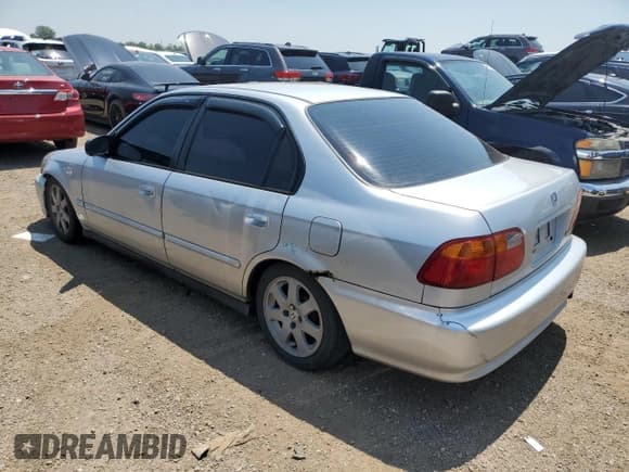 ✅ 1999 Honda Civic VP • VIN: 2HGEJ6613XH568076 • Lot: 64432315. Listed on Copart with 215,390 mi. Free auction sales archive from the USA and detailed vehicle history report at DreamBid. Image 2.