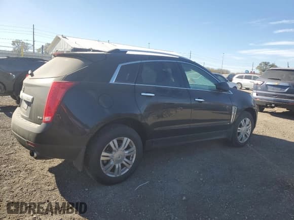 ✅ 2015 Cadillac SRX Luxury Collection • VIN: 3GYFNEE33FS570582 • Lot: 91162095. Wystawiony na Copart z przebiegiem 148 007 mil. Bezpłatny archiwum sprzedaży aukcyjnych z USA i szczegółowy raport historii pojazdu na DreamBid. Zdjęcie 3.