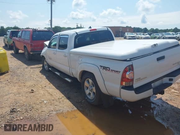 ✅ 2015 Toyota Tacoma PreRunner • VIN: 5TFKU4HN3FX007156 • Lot: 42460345. Listed on IAAI with 123,563 mi. Free auction sales archive from the USA and detailed vehicle history report at DreamBid. Image 3.