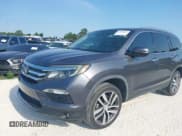 ✅ 2018 Honda Pilot Touring • VIN: 5FNYF6H97JB012138 • Лот: 42858851. Опубликован ранее на IAAI с пробегом 88 131 миль. Бесплатный доступ к архиву аукционных продаж из США и подробный отчёт об истории автомобиля на DreamBid. Изображение 6.