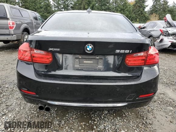 ✅ 2015 BMW 3 Series 328i xDrive • VIN: WBA3B5G57FNS12196 • Лот: 91198535. Опубликован ранее на Copart с пробегом 96 934 миль. Бесплатный доступ к архиву аукционных продаж из США и подробный отчёт об истории автомобиля на DreamBid. Изображение 6.