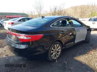 2014 Hyundai Azera с VIN KMHFG4JG7EA362185, выставлен на аукционе IAAI как лот 41877622 с пробегом 158 689 миль миль и . История ставок и продаж доступна на DreamBid. Изображение 4.