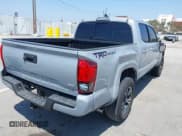 ✅ 2018 Toyota Tacoma SR5 • VIN: 3TMAZ5CN8JM061156 • Lot: 42477508. Listed on IAAI with 87,341 mi. Free auction sales archive from the USA and detailed vehicle history report at DreamBid. Image 4.