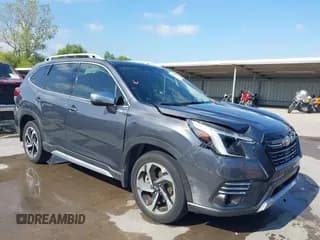 ✅ 2022 Subaru Forester Touring • VIN: JF2SKARC9NH525025 • Lot: 43561667. Listed on IAAI with 22,214 mi. Free auction sales archive from the USA and detailed vehicle history report at DreamBid. Image 1.