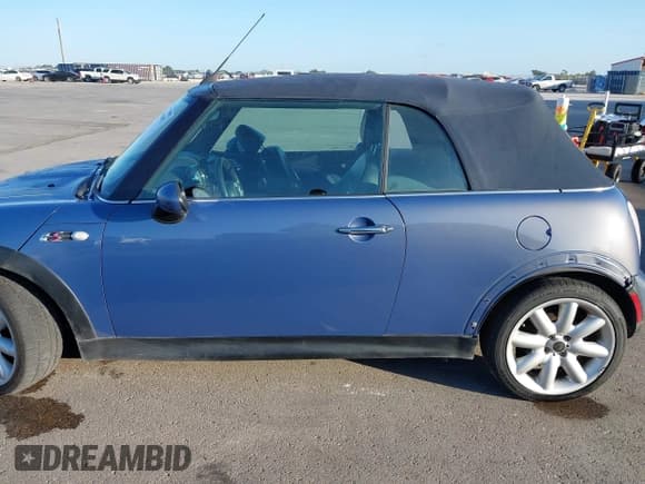 ✅ 2005 MINI Convertible S • VIN: WMWRH33475TF82636 • Lot: 43261691. Listed on IAAI with 127,918 mi. Free auction sales archive from the USA and detailed vehicle history report at DreamBid. Image 13.