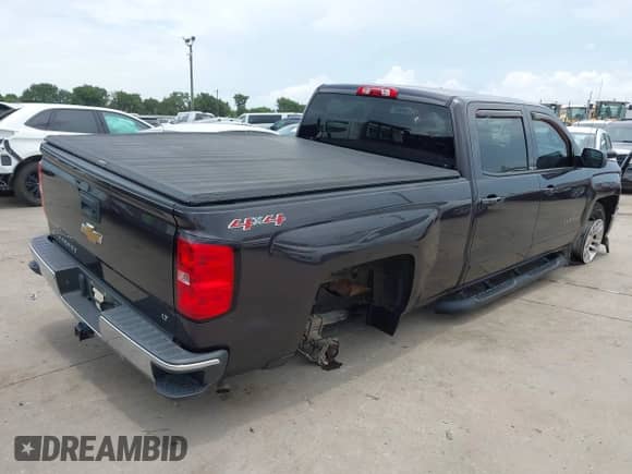 2015 Chevrolet Silverado 1500 LT z VIN 3GCUKRECXFG183351, wystawiony jako IAAI lot #42650034 z przebiegiem 130 129 mil mil oraz . Historia ofert i sprzedaży dostępna na DreamBid. Obrazek 4.