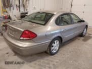 ✅ 2004 Ford Taurus SEL • VIN: 1FAFP56S04A135092 • Lot: 43803317. Listed on IAAI with 84,891 mi. Free auction sales archive from the USA and detailed vehicle history report at DreamBid. Image 4.