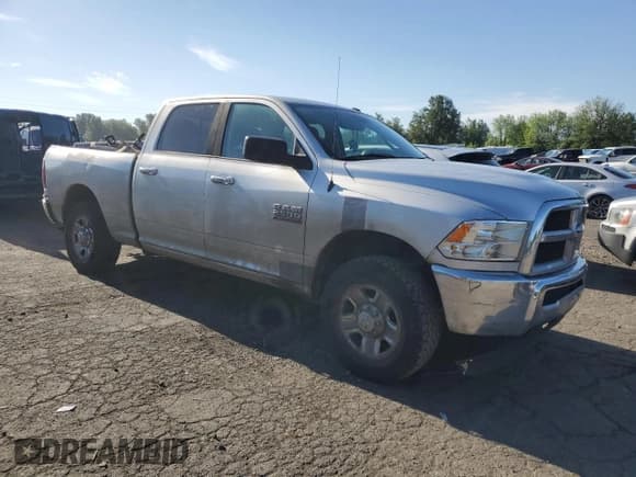 ✅ 2015 Ram 2500 SLT • VIN: 3C6TR4DT5FG573311 • Lot: 58505455. Listed on Copart with 216,405 mi. Free auction sales archive from the USA and detailed vehicle history report at DreamBid. Image 4.