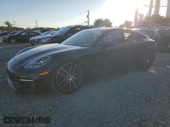 ✅ 2023 Porsche Panamera • VIN: WP0AJ2A72PL118990 • Лот: 85135335. Опубликован ранее на Copart с пробегом 20 592 миль. Бесплатный доступ к архиву аукционных продаж из США и подробный отчёт об истории автомобиля на DreamBid. Изображение 1.