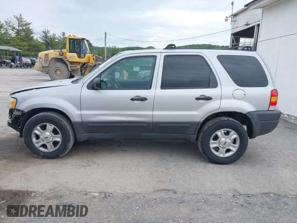 ✅ 2003 Ford Escape XLT Popular 2 • VIN: 1FMYU93193KC76018 • Lot: 42355904. Listed on IAAI with 233,131 mi. Free auction sales archive from the USA and detailed vehicle history report at DreamBid. Image 14.