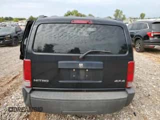 2007 Dodge Nitro SXT с VIN 1D8GU28K27W601732, выставлен на аукционе Copart как лот 72654904 с пробегом 123 249 миль миль и Списание • Salvage title. История ставок и продаж доступна на DreamBid. Изображение 6.