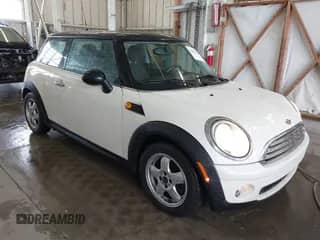 2009 MINI Hardtop with VIN WMWMF33529TU71262, listed as a IAAI auction lot 42835528 with 79,532 mi miles and . Bid and sale history available at DreamBid. Image 1.