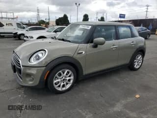 ✅ 2020 MINI Hardtop 4 Door Cooper • VIN: WMWXU7C05L2L70048 • Lot: 71445744. Listed on Copart with 21,115 mi. Free auction sales archive from the USA and detailed vehicle history report at DreamBid. Image 1.