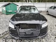 ✅ 2016 Audi A8 Sport • VIN: WAU43AFD2GN005719 • Лот: 60746275. Опубликован ранее на Copart с пробегом 125 802 миль. Бесплатный доступ к архиву аукционных продаж из США и подробный отчёт об истории автомобиля на DreamBid. Изображение 5.