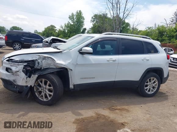 ✅ 2014 Jeep Cherokee Altitude • VIN: 1C4PJMCS2EW128356 • Lot: 42513328. Listed on IAAI with 89,884 mi. Free auction sales archive from the USA and detailed vehicle history report at DreamBid. Image 15.