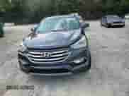 2017 Hyundai Santa Fe 2.4L с VIN 5NMZU3LBXHH018334, выставлен на аукционе Copart как лот 81696185 с пробегом 121 529 миль миль и Списание • Salvage title. История ставок и продаж доступна на DreamBid. Изображение 13.