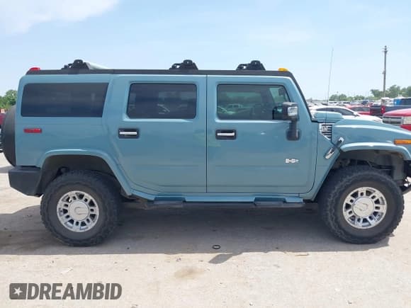 ✅ 2007 Hummer H2 SUV • VIN: 5GRGN23U17H102931 • Лот: 42262922. Опубликован ранее на IAAI с пробегом 299 804 миль. Бесплатный доступ к архиву аукционных продаж из США и подробный отчёт об истории автомобиля на DreamBid. Изображение 13.
