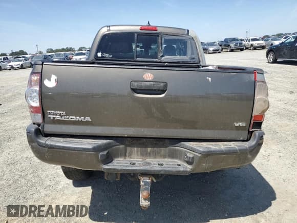 ✅ 2015 Toyota Tacoma • VIN: 3TMLU4EN7FM188941 • Lot: 56965585. Listed on Copart with 124,192 mi. Free auction sales archive from the USA and detailed vehicle history report at DreamBid. Image 6.