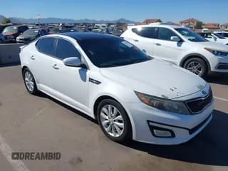 ✅ 2015 Kia Optima EX • VIN: 5XXGN4A70FG418200 • Lot: 43529833. Listed on IAAI with 174,604 mi. Free auction sales archive from the USA and detailed vehicle history report at DreamBid. Image 1.