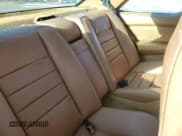 ✅ 1985 Mercedes-Benz 500 • VIN: WDBCA44D5FA143302 • Lot: 86618514. Wystawiony na Copart z przebiegiem 115 565 mil. Bezpłatny archiwum sprzedaży aukcyjnych z USA i szczegółowy raport historii pojazdu na DreamBid. Zdjęcie 10.