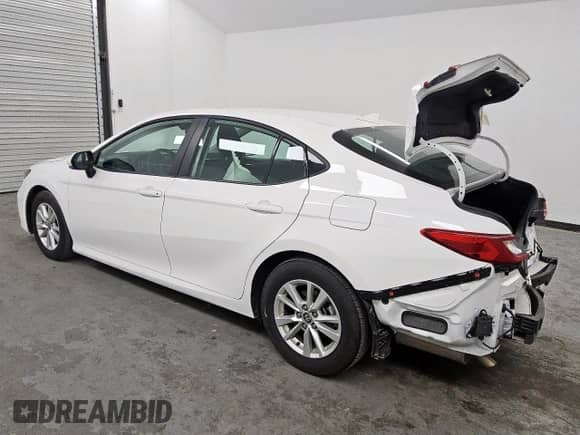 2025 Toyota Camry LE with VIN 4T1DAACKXSU001360, listed as a Copart auction lot 85889365 with 28,029 mi miles and Salvage title. Bid and sale history available at DreamBid. Image 2.