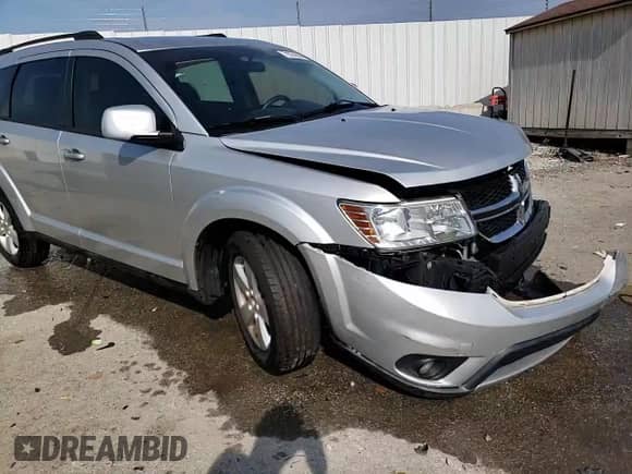 2012 Dodge Journey SXT с VIN 3C4PDDBG9CT249246, выставлен на аукционе Copart как лот 71074295 с пробегом 116 067 миль миль и На запчасти • Non repairable. История ставок и продаж доступна на DreamBid. Изображение 15.