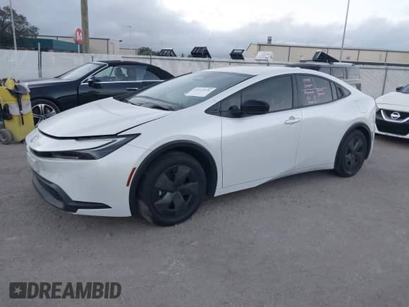 2024 Toyota Prius LE with VIN JTDACAAU6R3035544, listed as a IAAI auction lot 43413536 with 19,097 mi miles and . Bid and sale history available at DreamBid. Image 2.