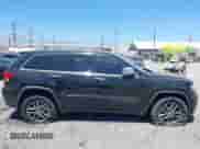2018 Jeep Grand Cherokee Limited z VIN 1C4RJEBG5JC512008, wystawiony jako IAAI lot #42897081 z przebiegiem 141 938 mil mil oraz . Historia ofert i sprzedaży dostępna na DreamBid. Obrazek 14.