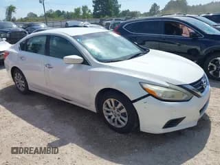 ✅ 2017 Nissan Altima SR • VIN: 1N4AL3AP1HN318223 • Lot: 43273148. Listed on IAAI with 214,383 mi. Free auction sales archive from the USA and detailed vehicle history report at DreamBid. Image 1.