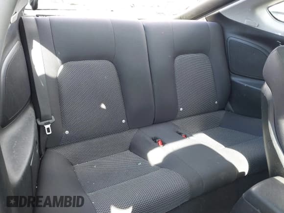 ✅ 2005 Hyundai Tiburon GS • VIN: KMHHM65D45U183100 • Лот: 43627934. Опубликован ранее на IAAI с пробегом 130 401 миль. Бесплатный доступ к архиву аукционных продаж из США и подробный отчёт об истории автомобиля на DreamBid. Изображение 8.